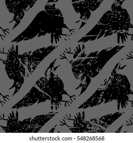 Seamless texture with crows. Repeating pattern with ravens. The gloomy monochrome background. It can be use for background, clothing design, wrapping paper or your design.