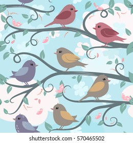 seamless texture with cute birds on branches in spring 