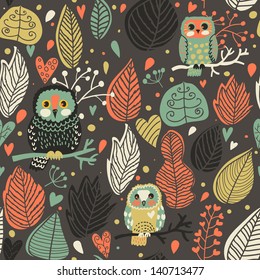 Seamless texture with cute owls and leafs in the night. Endless floral pattern. You can use it in textile design, greeting cards, graphic design.