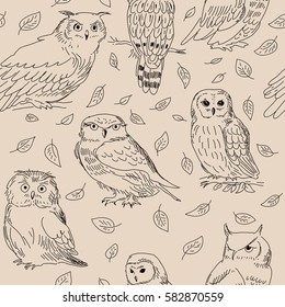 Seamless texture of a cute owls with leaves
