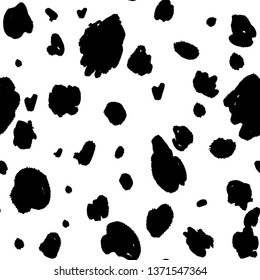 Seamless texture of dalmatian leather. Black and white dog skin. Black spots on a white background. Vector EPS 10.