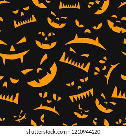 Seamless texture with different halloween orange smilies on black background