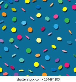Seamless texture with falling colored paper confetti on blue background.