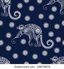 Seamless texture of fire monkey, symbol of 2016. Continuous pattern of ape, decorated with floral pattern. Suitable for New Year's design: cloth, web, wallpaper, wrapping . Vector illustration.