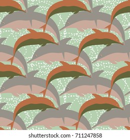 Seamless texture with a flock of dolphins under water, illustration for background