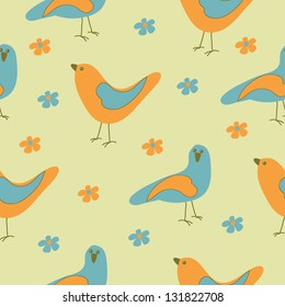 Seamless texture with flowers and birds.