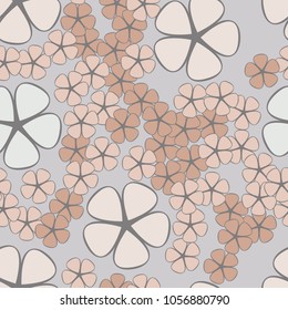Seamless texture. Flowers of four colors, geometrically regular shape, two contrasting sizes