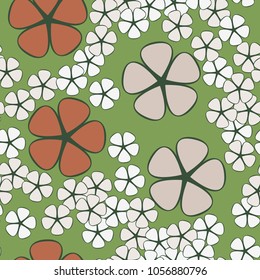 Seamless texture. Flowers of four colors, geometrically regular shape, two contrasting sizes