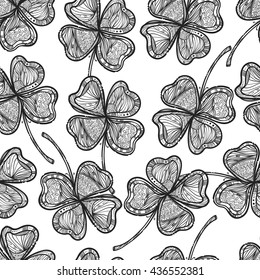 Seamless texture with a four-leaf clover. Nice doodle illustration. Great textures for your design. It can be use for background, clothing design, wrapping paper.