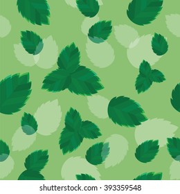 Seamless texture with fresh mint leaves on green background