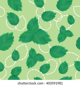 Seamless texture with fresh mint leaves on green background