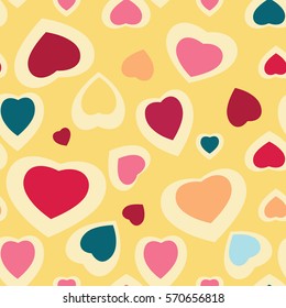 Seamless texture with funny hearts. Chaotic arrangement pattern