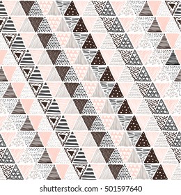 Seamless texture with a graphic pattern of triangles. Drawn by hand, vector illustration.
