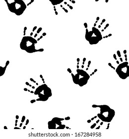 Seamless texture with a graphically handprints
