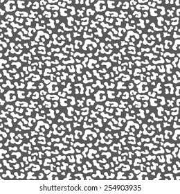 Seamless texture of gray leopard spots scrawl 