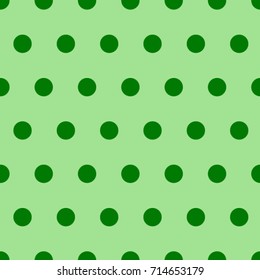 Seamless texture. Green circles on a Green background