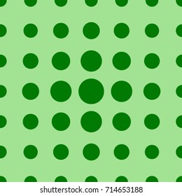 Seamless texture. Green circles on a Green background