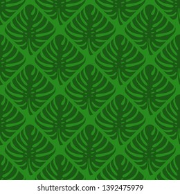 Seamless texture of green leaf monstera on a green background. Geometric pattern. Tropical plant. Vector.