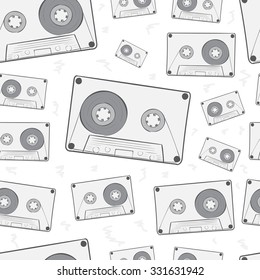 Seamless texture with grey contours of audio cassettes