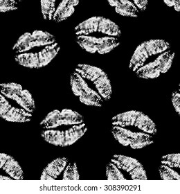 Seamless texture of halftone white lip prints on black background. vector illustration.