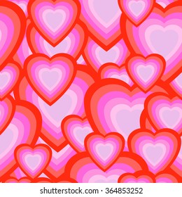 Seamless texture of hearts. Pink and red hearts