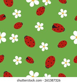 Seamless texture with ladybugs on green grass with white flowers