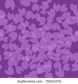 Seamless texture. Lilac stains on a violet background