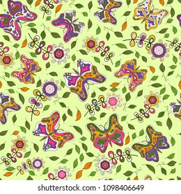 Seamless texture. Multicolor pattern of butterflies, flowers and leaves.
