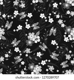  Seamless texture. Multicolor pattern of butterflies, flowers and leaves. Embroidery colorful simplified. monochrome black and white