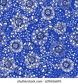 Seamless texture. Multicolor pattern   flowers, foliage and twigs. Shades of blue
