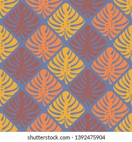 Seamless texture of multi-colored leaves of Monstera on a blue background. Geometric pattern. Tropical plant. Vector.