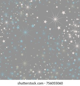 Seamless texture from multi-colored stars. Chaotic spread. Festive texture.