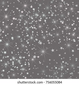 Seamless texture from multi-colored stars. Chaotic spread. Festive texture.