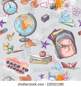 Seamless texture on a school theme with the image of a backpack, globe, paint and other items