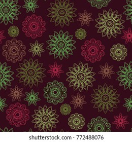 Seamless texture of pink and green geometric flowers on a dark red background