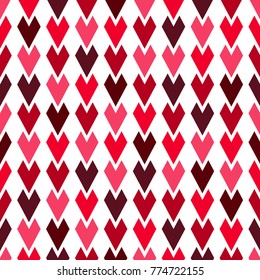 Seamless texture of pink and red hearts on a white background