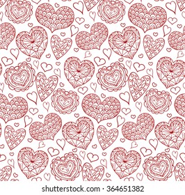 Seamless texture with red contours of the doodle hearts decorated boho patterns for your creativity