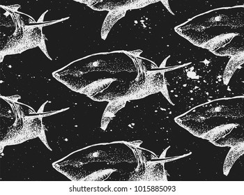 Seamless texture. Repeating background. Tile pattern. Ornament with beautiful hand drawn shark with open mouth. White sharks on a black background. 