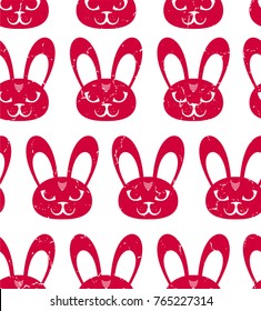 Seamless texture. Repeating, tile pattern with red rabbits, bunny, on a white background. It can be used as wallpaper, desktop, printing, wrapping, fabric or background for your blog, covers.