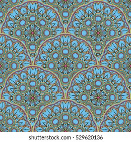  Seamless texture with round ornaments. Boho style. Vector art