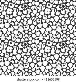 Seamless texture with silhouettes of birds, animals, flowers, butterflies, berries. Vector.