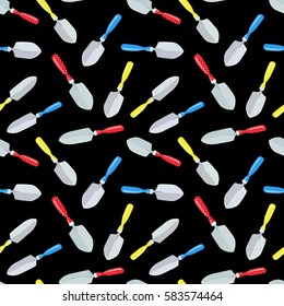 seamless texture with small gardening spades on black background