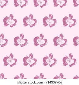 Seamless texture. Stylized purple orchids on a pink background