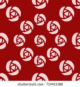 Seamless texture. Stylized roses on a red background