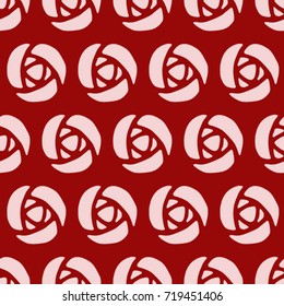 Seamless texture. Stylized roses on a red background