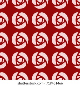 Seamless texture. Stylized roses on a red background