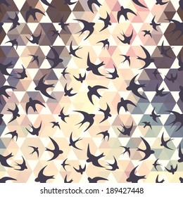 Seamless texture with the swallow, and hexagons. Black silhouettes of birds. Mosaic effect