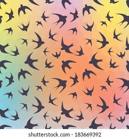 Seamless texture with the swallows, and rainbow hexagons.