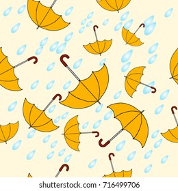Seamless texture. Umbrellas on a yellow background