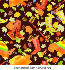 seamless texture with umbrellas and rubber boots on background of autumn leaves
